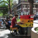Man playing piano in Denver