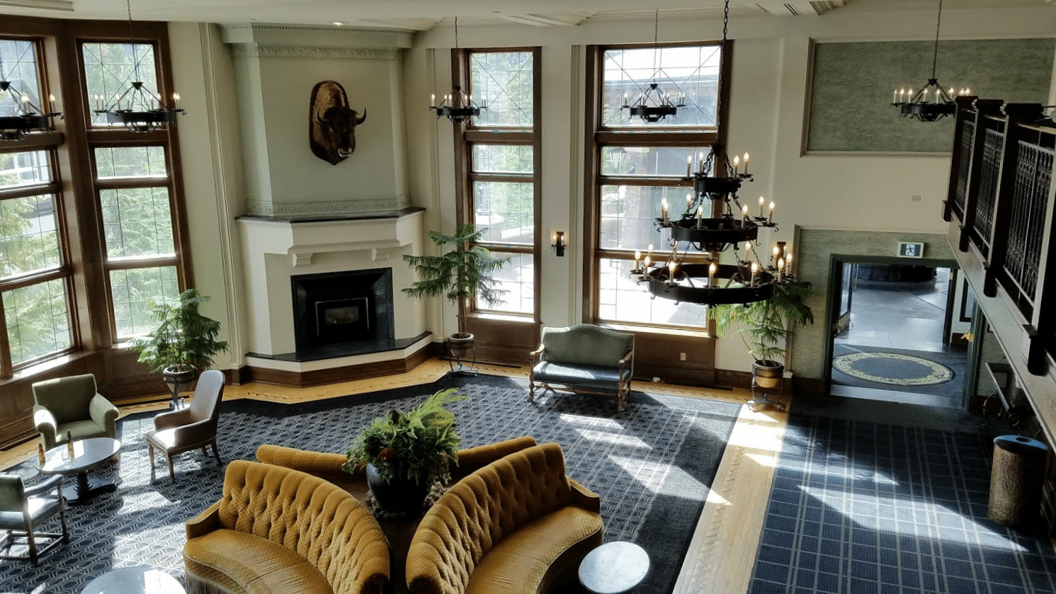 A parlor with Buffalo head over the fireplace at the Banff Springs Hotel 