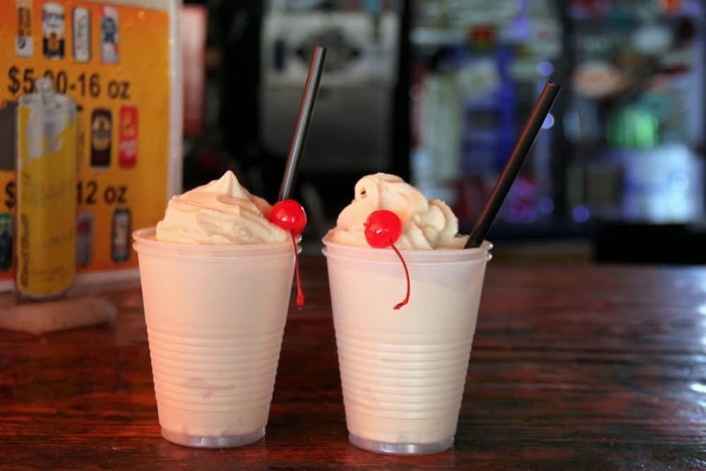 Alabama Bushwacker cocktail is a rum drink served at the Flora Bama's annual mullet toss #Alabama #fishtoss #cocktail #blendeddrink #rum #rumdrink