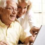 Senior couple on computer