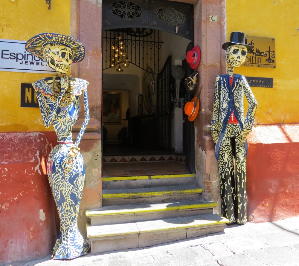 Day of the Dead skeletons at entrance to courtyard in San Miguel de Allende