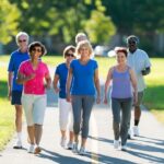 Seniors getting their steps in at a park.