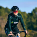 Elegant woman cycling outdoors