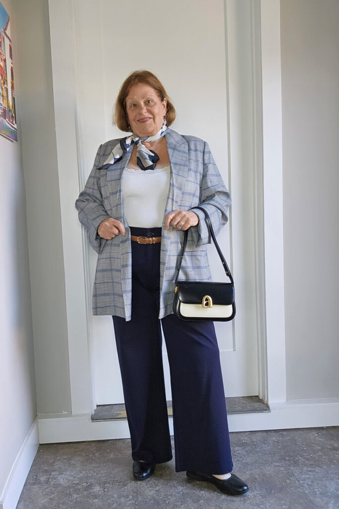Blazer and pants with a scarf and purse