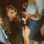 People enjoying a wine tasting.