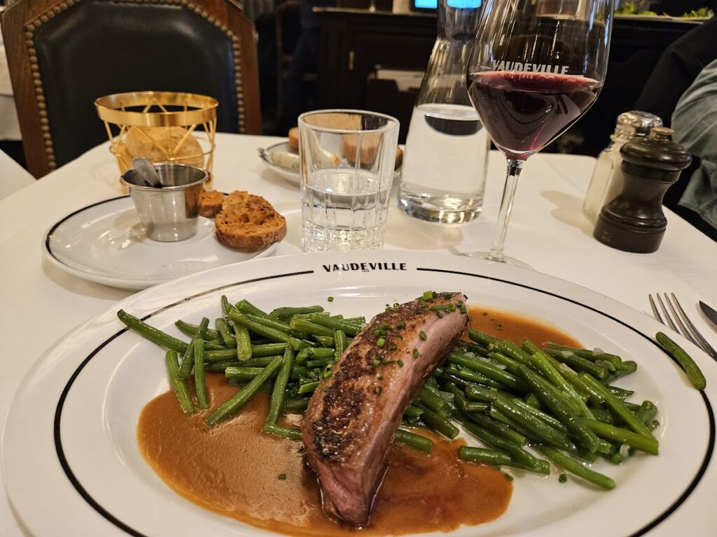 Having duck at Vaudeville in Paris.